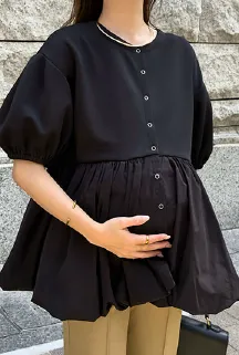 ボタンを閉めてトップス風に着用すれば、バルーンシルエットが自然にお腹まわりをカバー